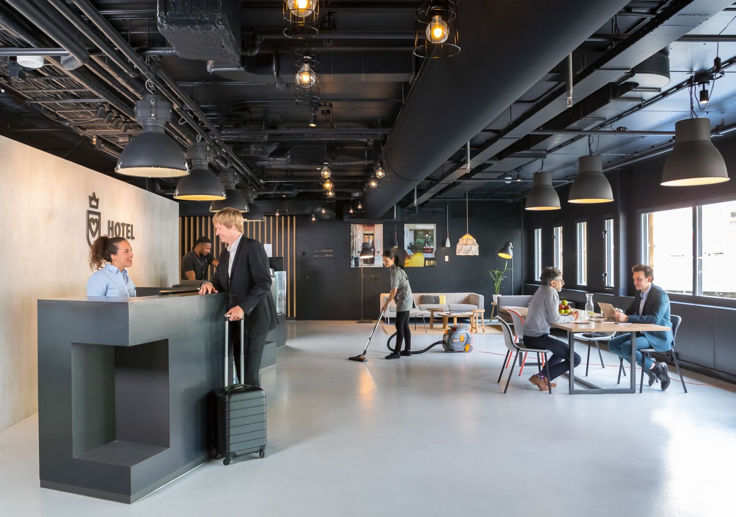 TASKI AERO vacuum in hospitality sector — wide general shot